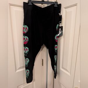 Torrid Black Leggings with Green and Pink Skull Pattern